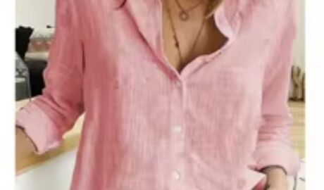 A perfect blend of comfort and elegance, this long-sleeve blouse features a soft cotton-linen fabric with a relaxed, oversized fit.